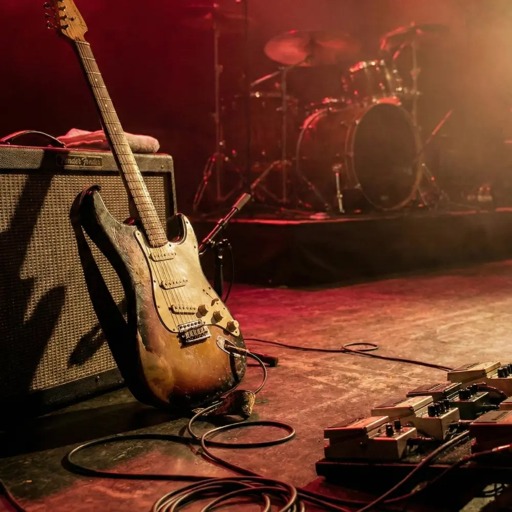 AI Band Name Generator interface showing options for Metal, Rock and Punk genres.